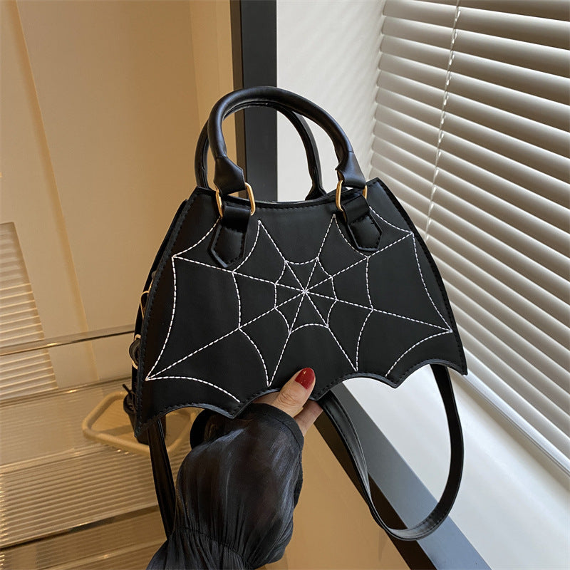 Bolso bandolera telaraña